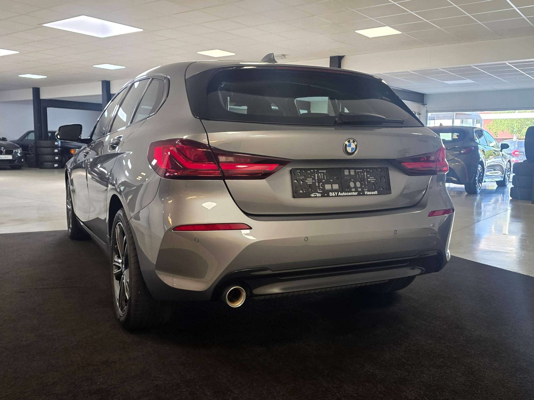 BMW 1 Serie 116 116iA OPF Sport Edition 3jaar BMW garantie, Auto's, 1 Reeks, Gebruikt, Zwart, 5 deurs
