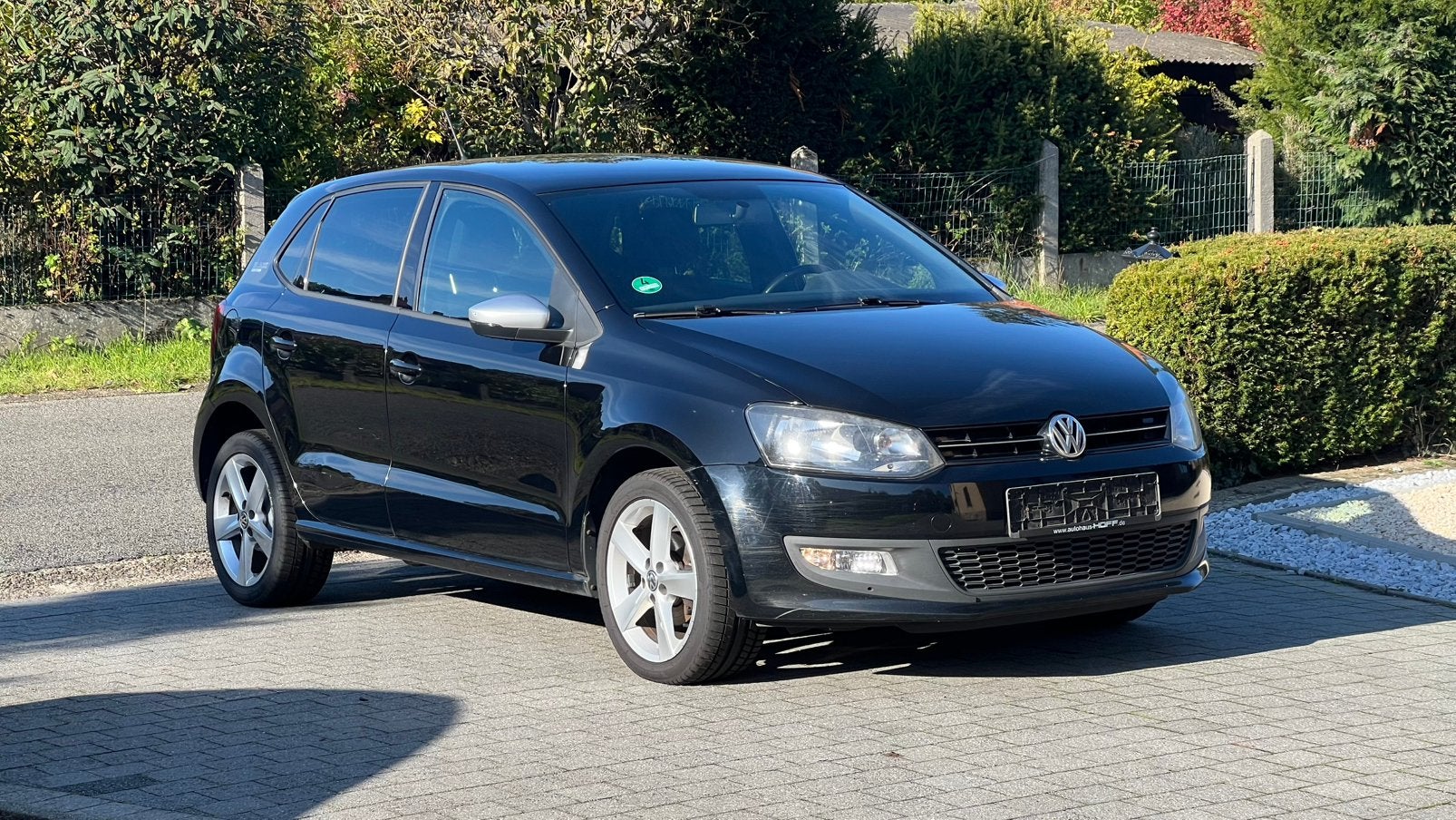 Volkwagen Polo 1.2 benzine 2012, Dealer onderhouden, Elektrische ramen, Zwart, Handgeschakeld