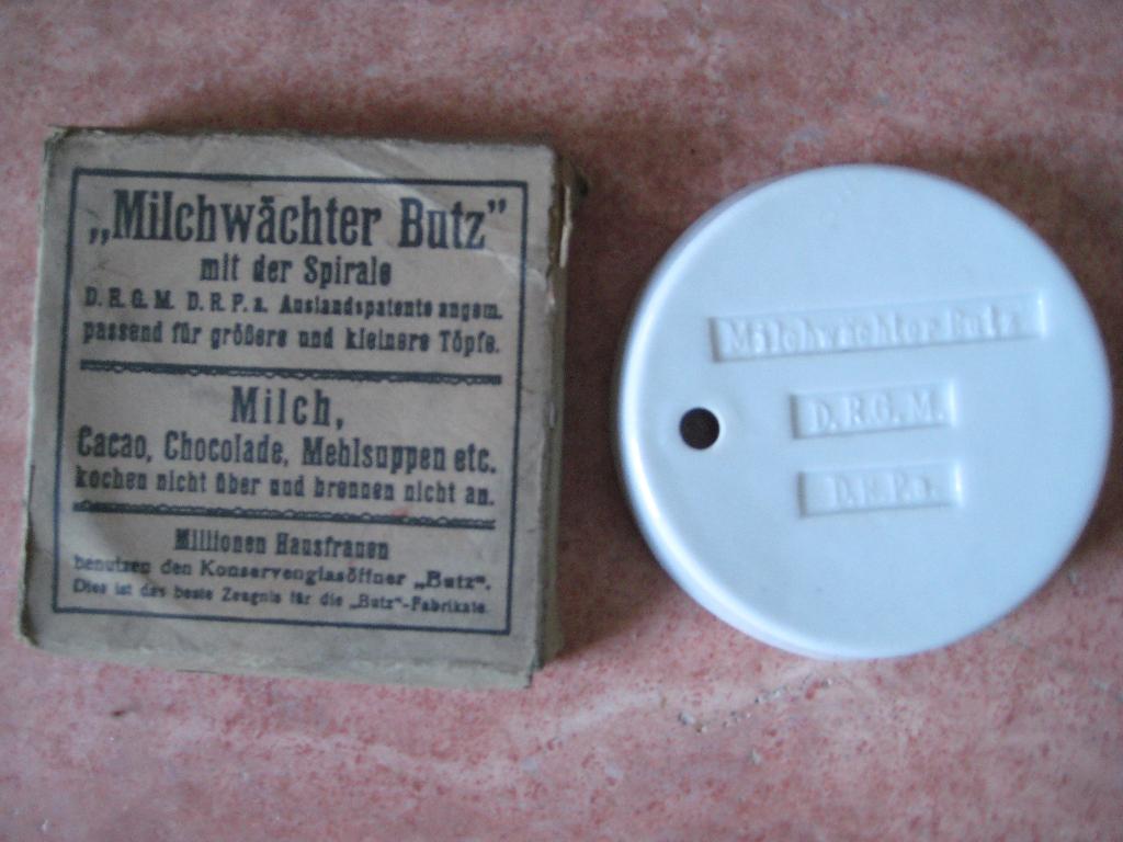 porseleinen spiraal melk-overkoker- Milkwachter Butz, Antiek en Kunst, Ophalen of Verzenden