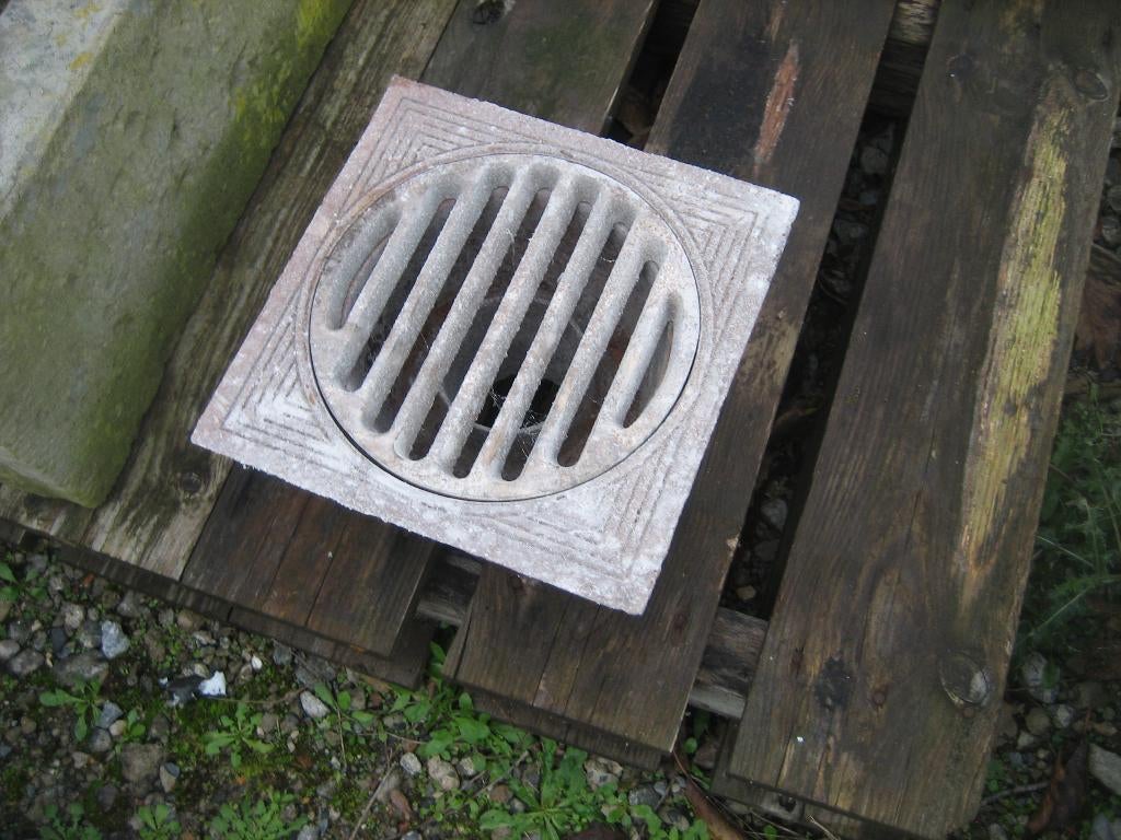 oude gietijzeren afvoerput, Ophalen