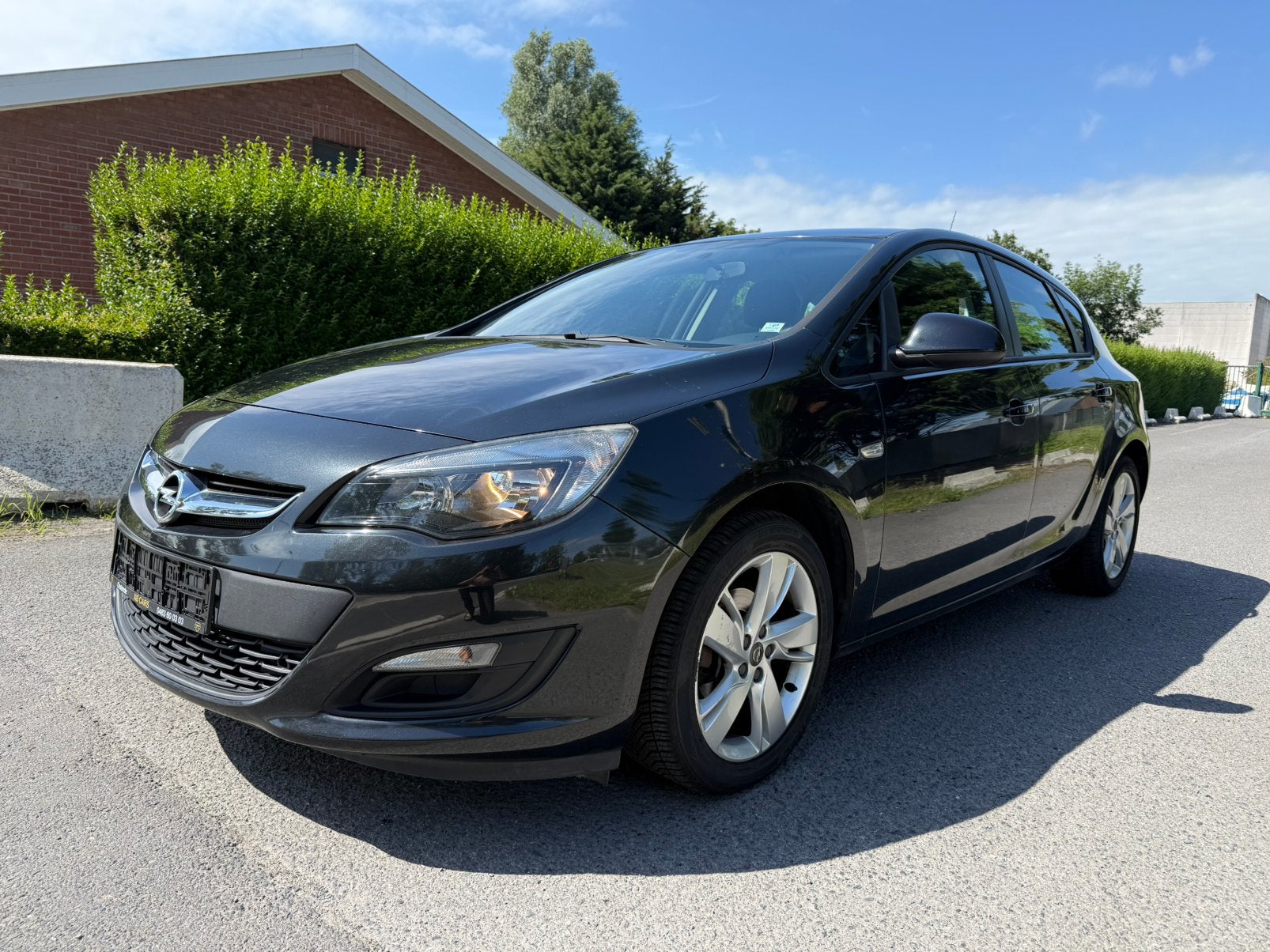 Opel Astra | 2012 | Benzine | 75.400Km | Airco | Garantie |, Auto's, Opel, Dealer onderhouden, Stof, Zwart, Zwart