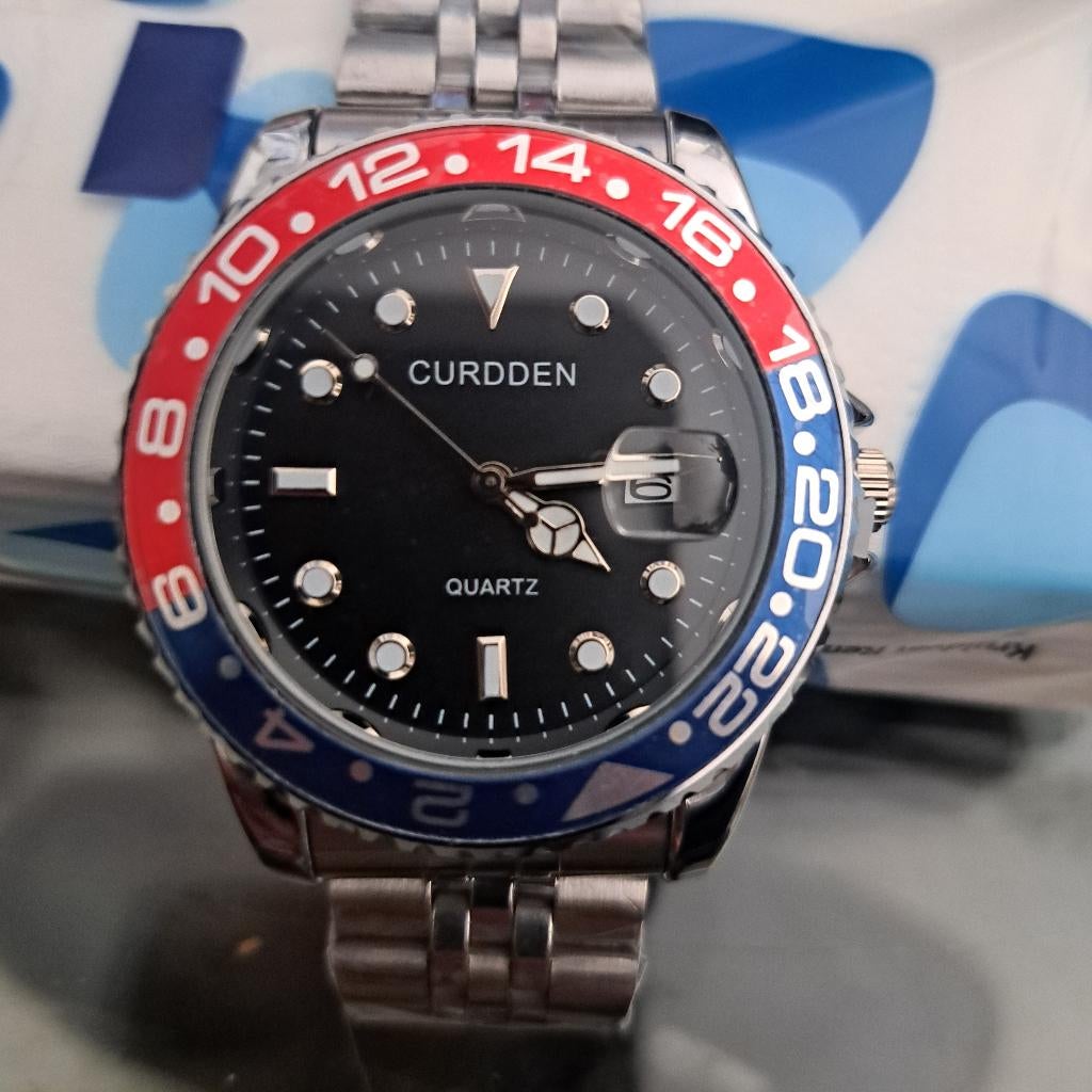 Curidenn rvs uurwerk red/blue kwarts 20€ pper stuk, Bijoux, Sacs & Beauté, Montres | Hommes, Rolex, Acier, Enlèvement, Acier