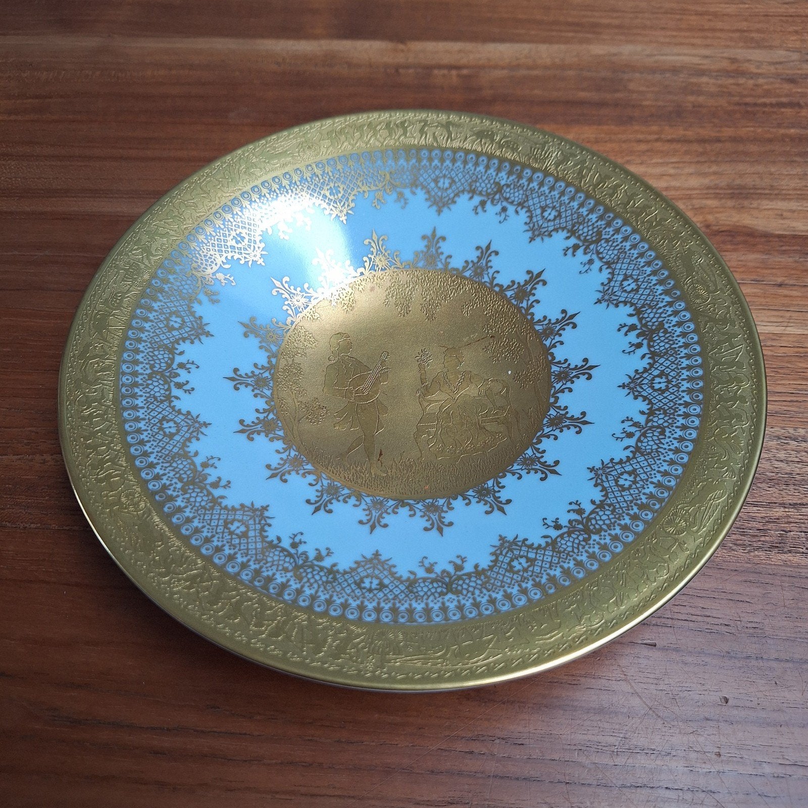porseleinen bord met een blauw en goudkleurig ontwerp, Ophalen