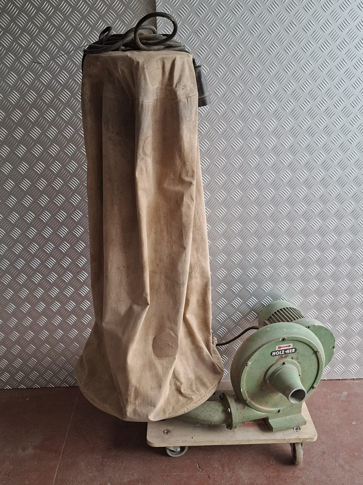 Stofafzuiging Holz-her, Ophalen