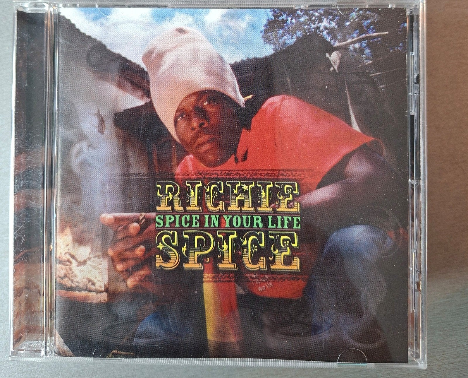 CD. Richie Spice. Ajoutez du piquant à votre vie., CD & DVD, CD | Reggae & Ska, Enlèvement ou Envoi