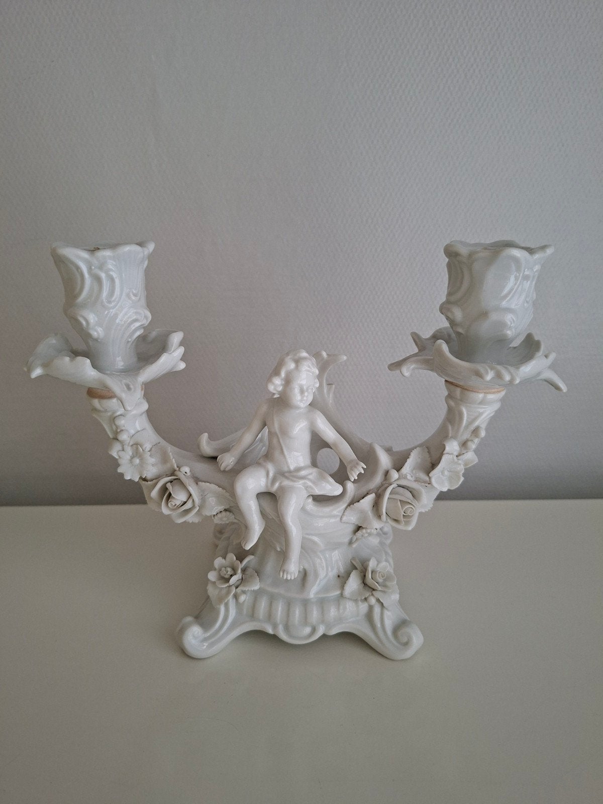 kandelaar beeldje, Ophalen