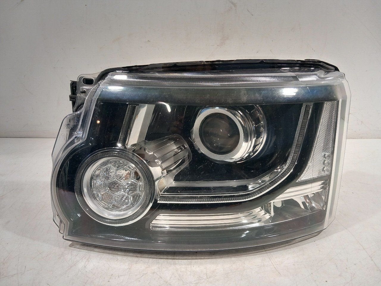 Koplamp links Land Rover Discovery, Onderdelen@venauto.nl, Van der Ven Autorecycling B.V., Land Rover, Ettenseweg 76, 4706 PB Roosendaal, The Netherlands