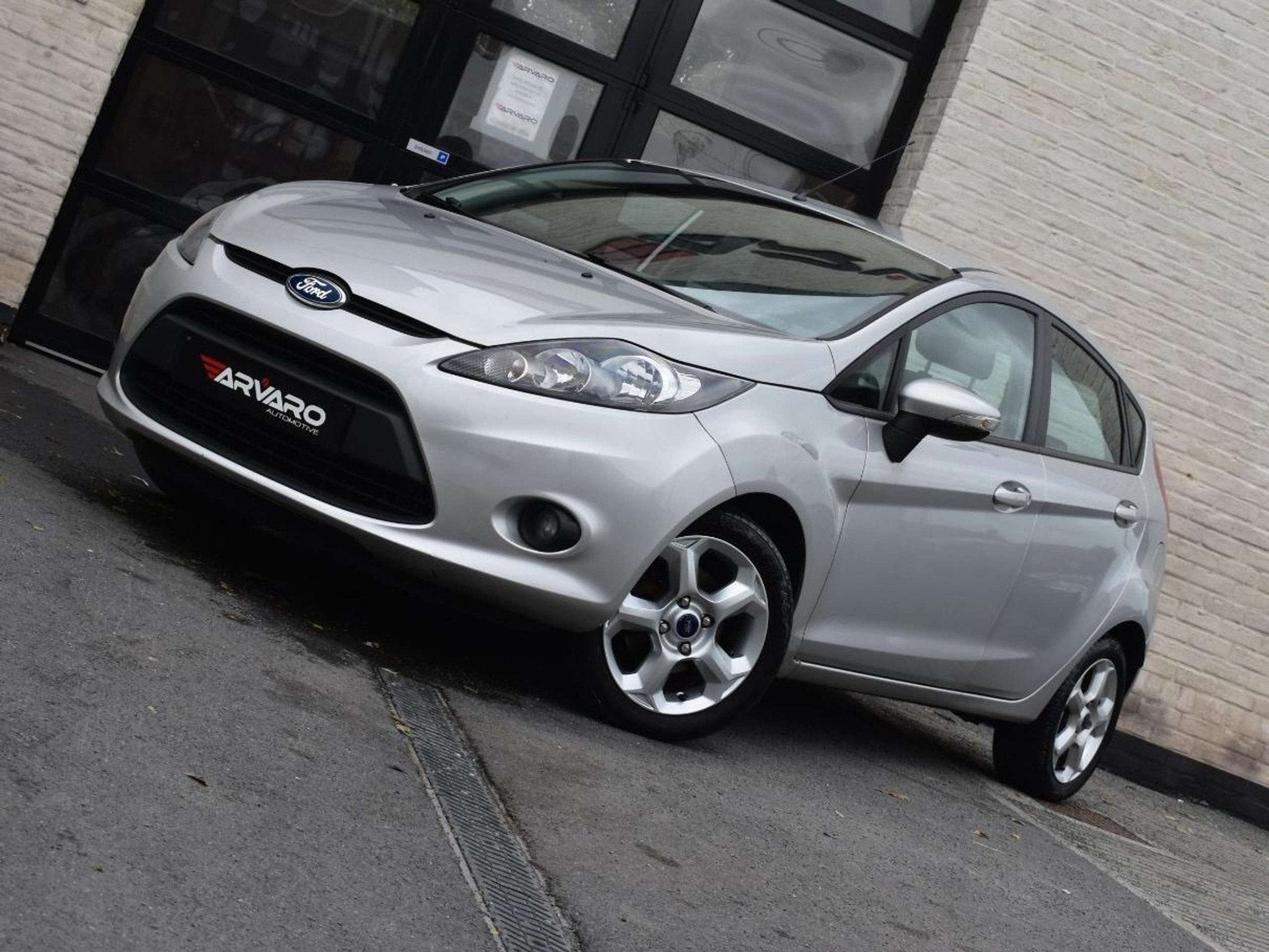 Ford Fiesta 1.25i Titanium / Airco / Topstaat / Garantie, Autos, 1242 cm³, Argent ou Gris, Achat, Volant multifonction