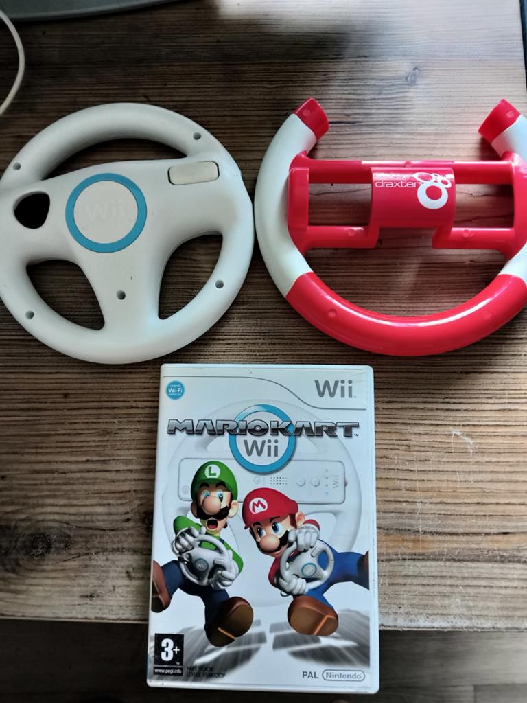 Mario Kart met stuurtjes - Nintendo Wii, Verzenden, Racen en Vliegen, Zo goed als nieuw, 3 spelers of meer