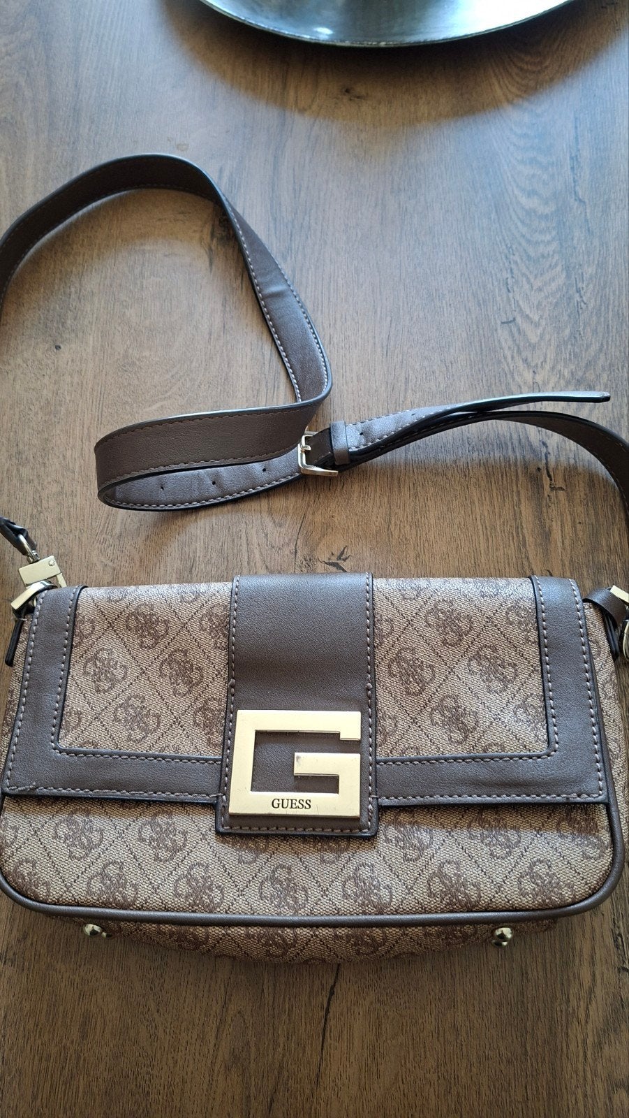 cross body tas, Ophalen