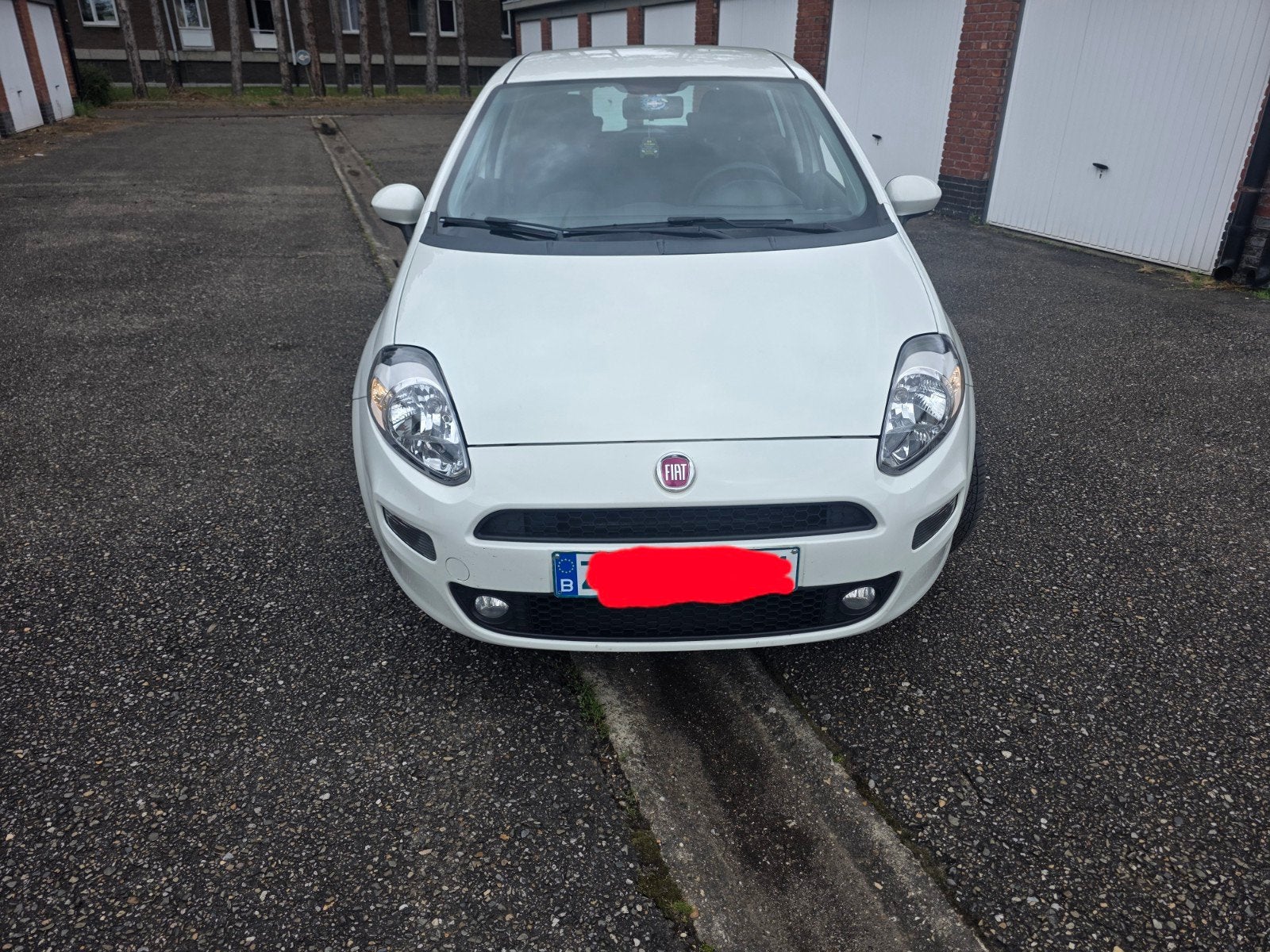 Fiat punto 1.2i Benzine bouwjaar 2015 Euro 6b Airco, Auto's, Stof, 4 cilinders, Wit, Handgeschakeld