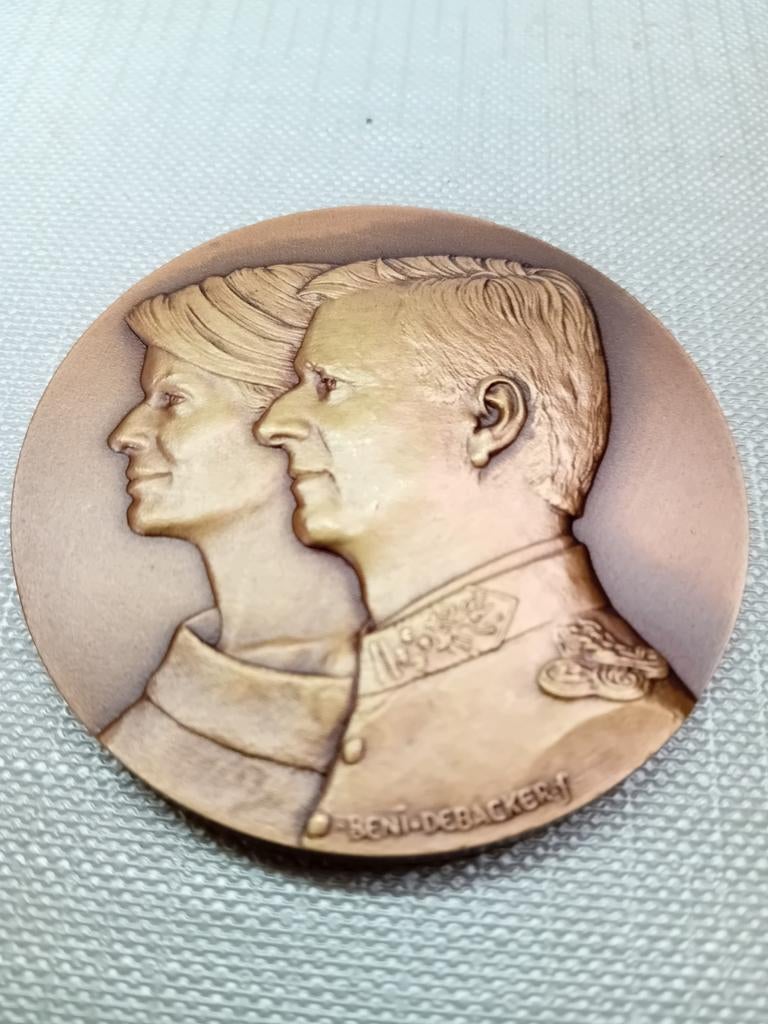 Bronzen medaille koningin en koning, Ophalen