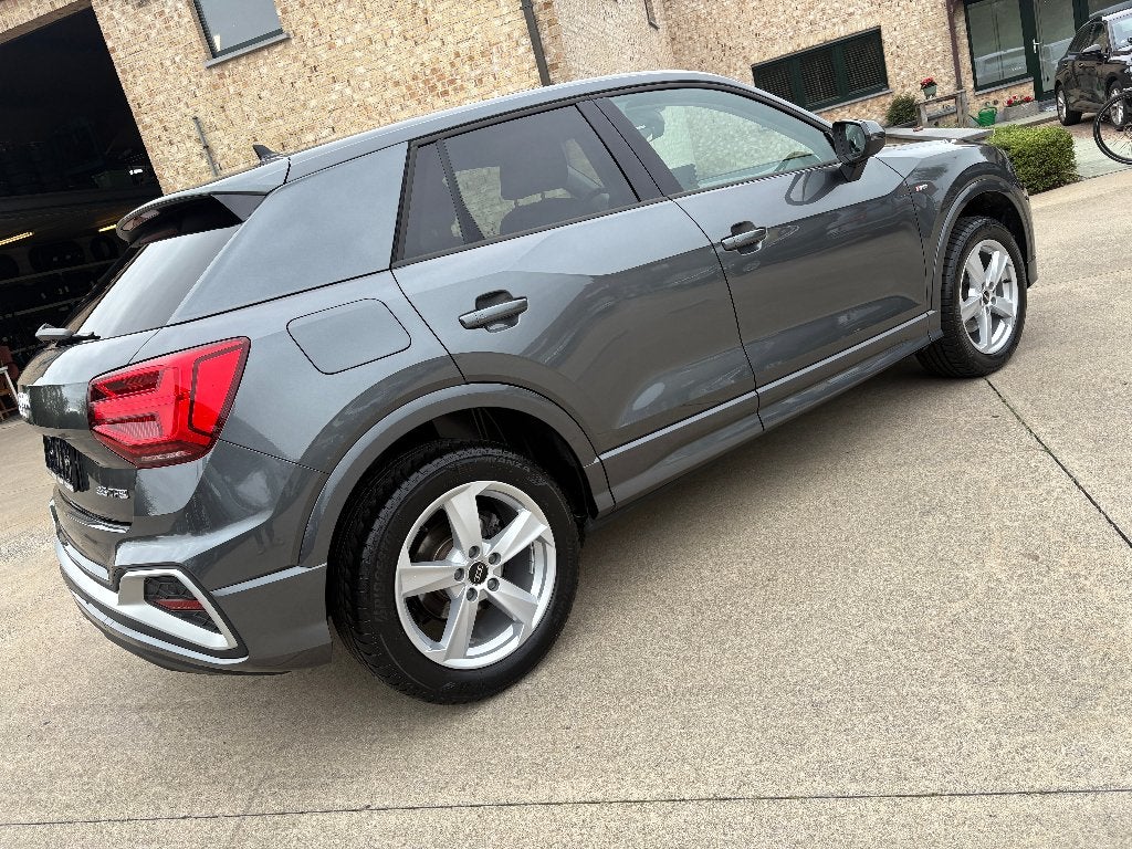 Audi Q2 35 TFSI S line S tronic + Leder + Camera 10-2025, Auto's, 4 cilinders, Leder, Dealer onderhouden, Lane Keeping Assist