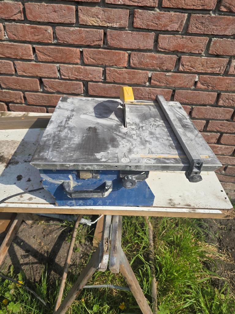 Carat tegelzaag, Ophalen