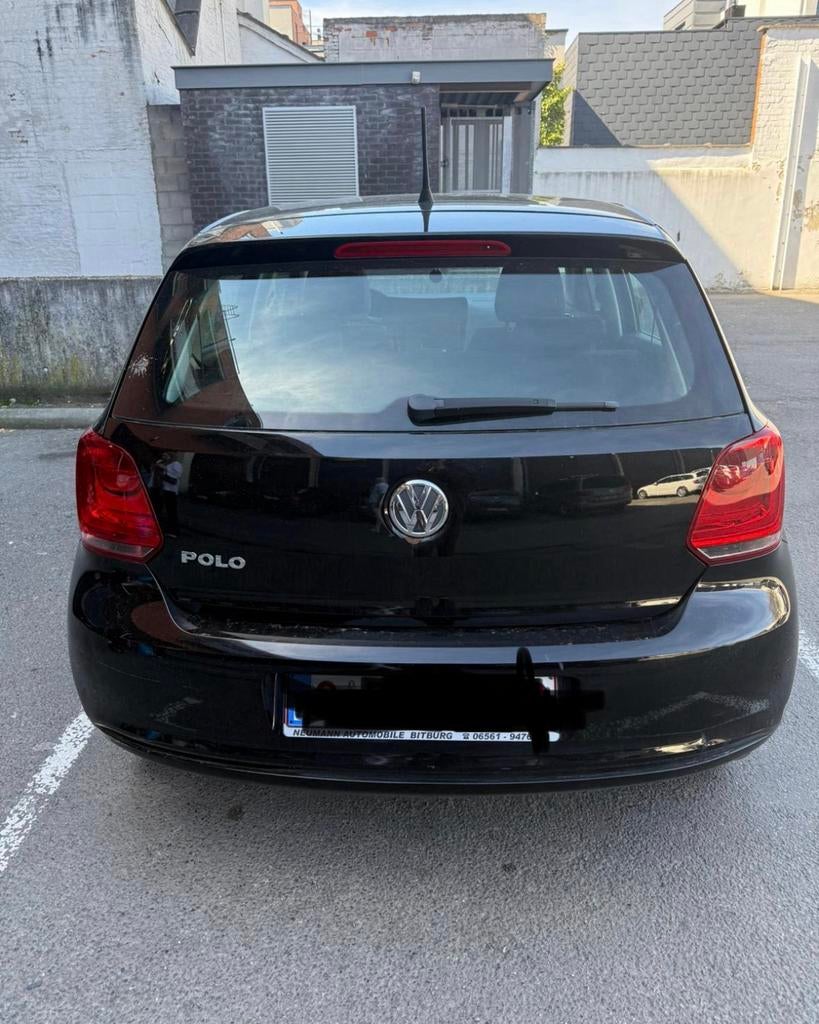 Volkswagen Polo 1.2 benzine, Auto's, Volkswagen, Euro 5, Zwart, Handgeschakeld, 5 deurs