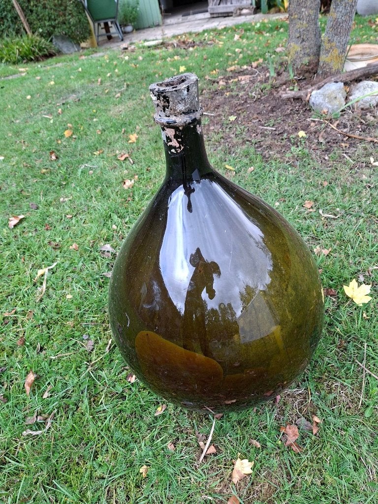 bouteille damejane/old basket, Enlèvement