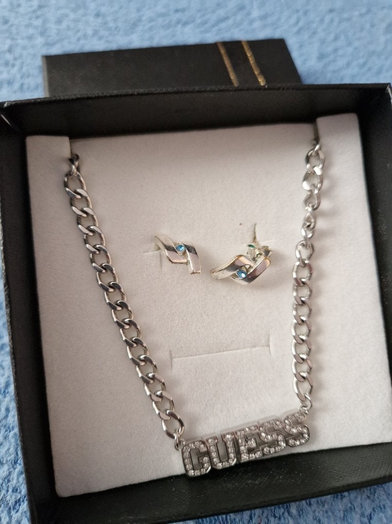 hals ketting guess, Ophalen