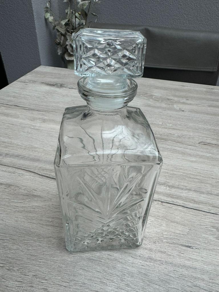 Glazen drankfles, Enlèvement