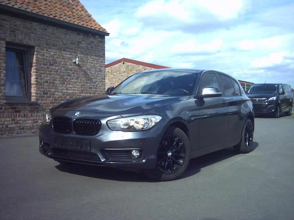 BMW 116i (2016) PDC,TEL,AC,..., Auto's, BMW, Bedrijf, Te koop, 1 Reeks, ABS, Airbags, Airconditioning, Alarm, Bluetooth, Boordcomputer