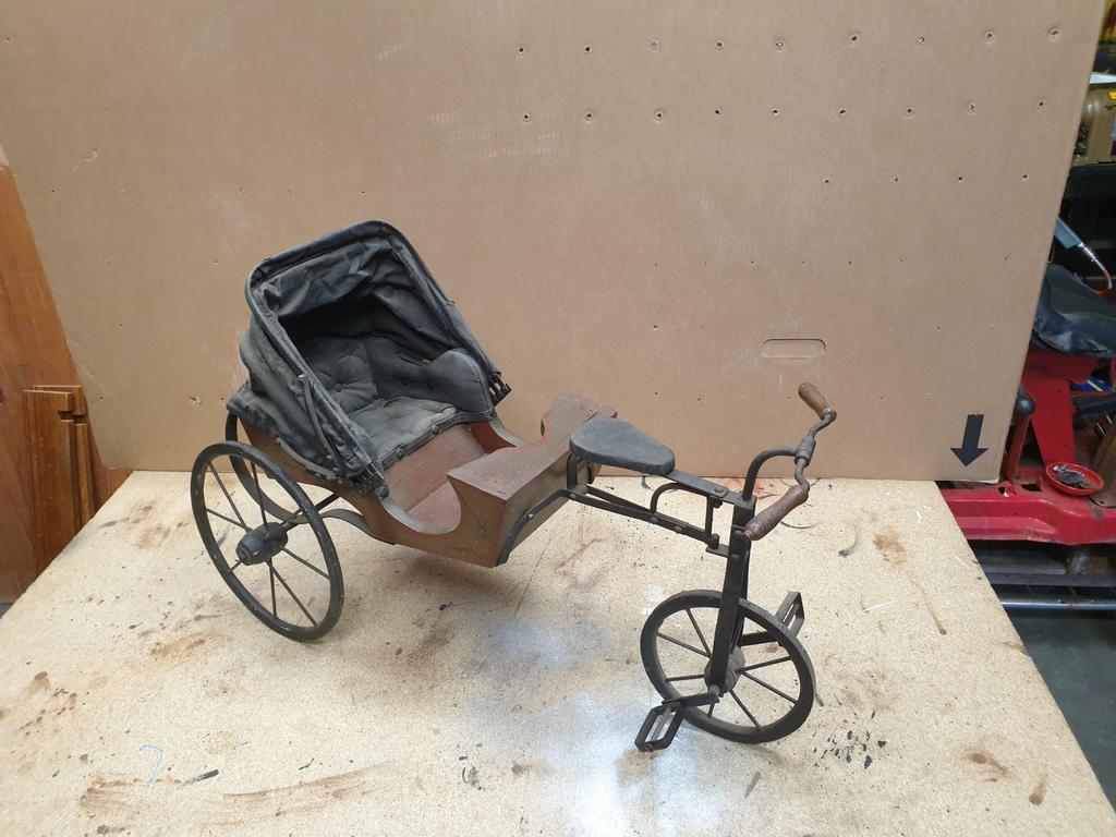 Driewieler poppenwagen, Ophalen