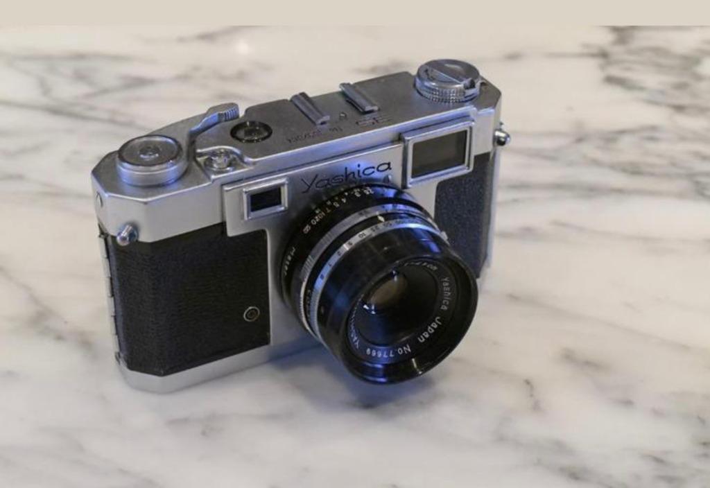 Yashica 35 met 4.5cm/2.8 en lichtmeter., Verzamelen, Ophalen of Verzenden, 1940 tot 1960, Fototoestel