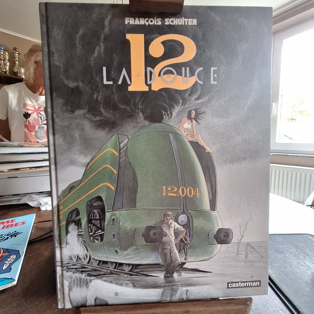 la douce 12 schuiten casterman, Boeken, Eén stripboek, Ophalen of Verzenden, Zo goed als nieuw, Schuiten / Peeters