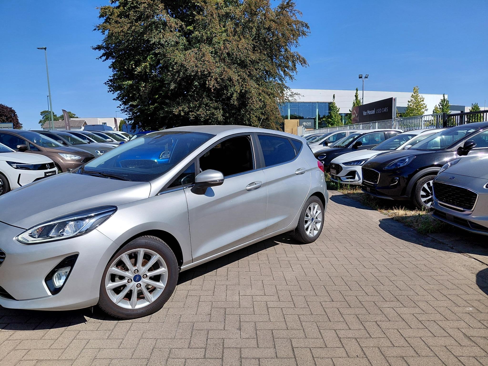 Ford Fiesta 1.1i 63kW Titanium, Auto's, Ford, Voorwielaandrijving, Stof, Automatische klimaatregeling, https://public.car-pass.be/vhr/b7b5220b-9bd7-4663-adda-66510f6b10d3
