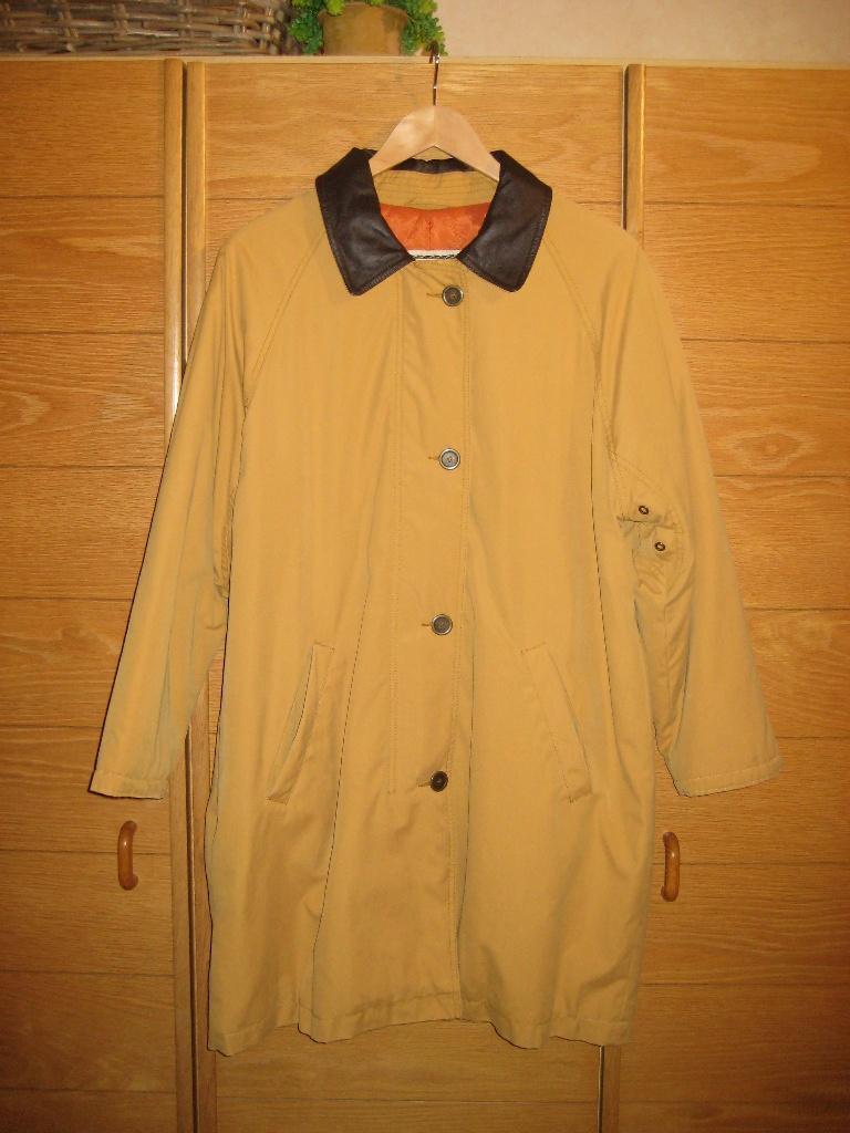 Okerkleurige winterjas met lederlook kraagje maat 40-42, Maat 38/40 (M), Overige kleuren, Ophalen of Verzenden, Zo goed als nieuw