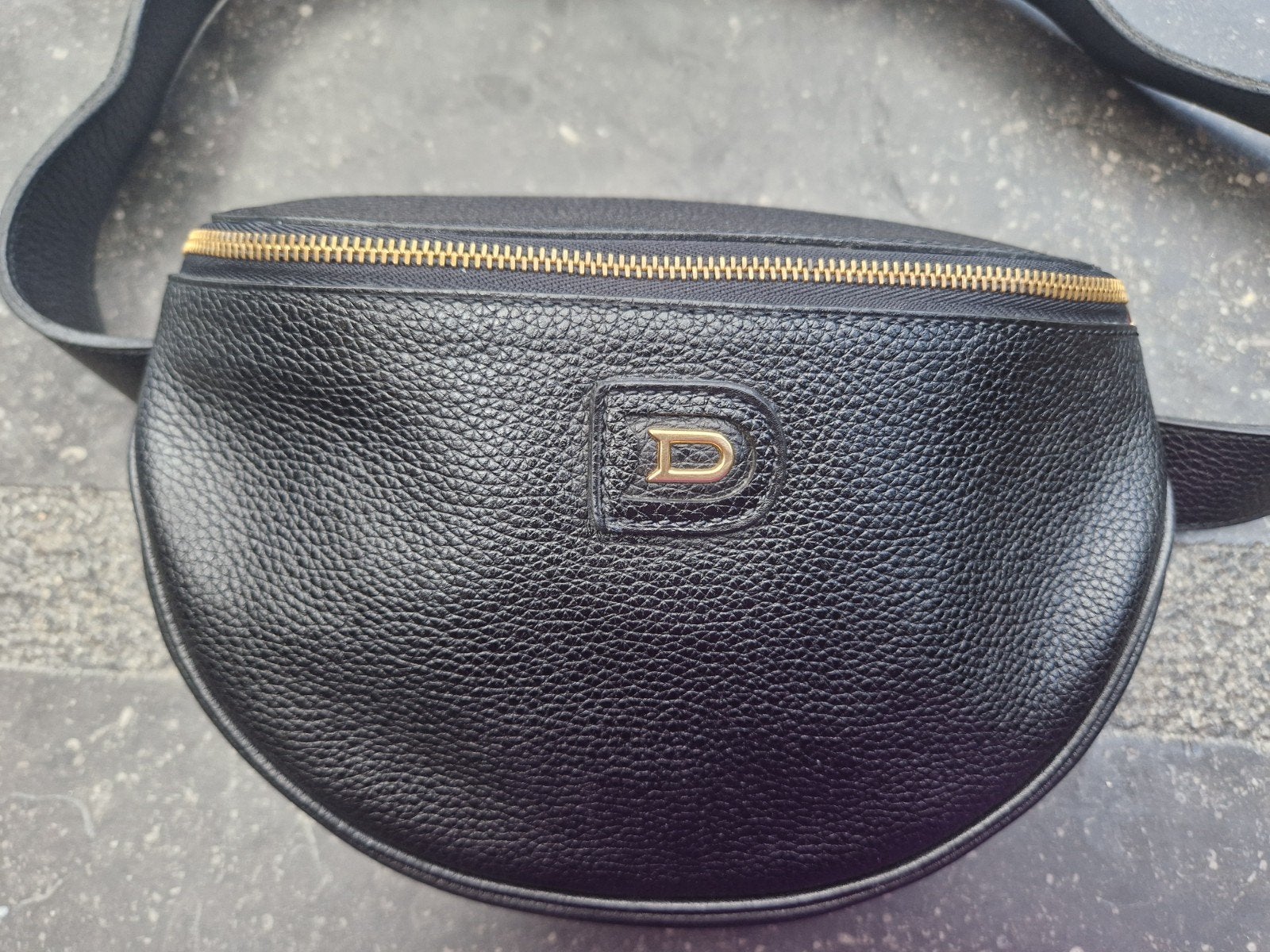 Prachtige zwarte heuptas van Delvaux. Model Musette, Ophalen of Verzenden