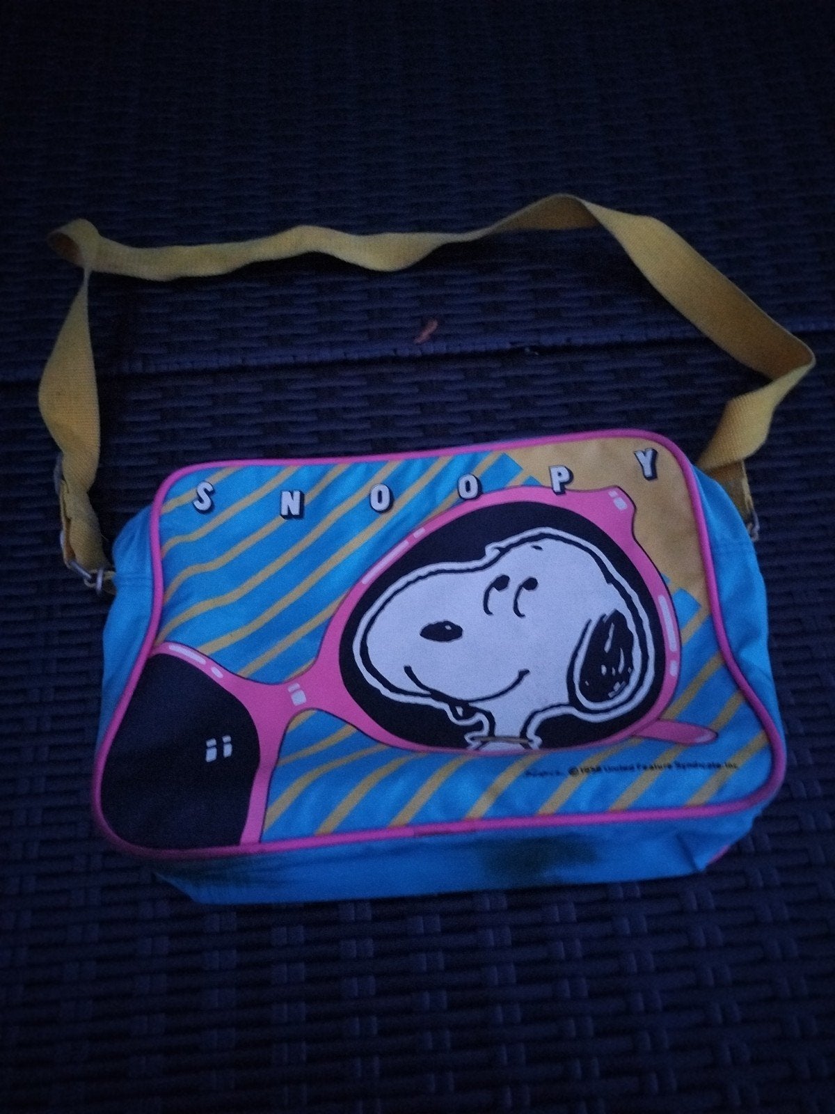 handtas snoopy, Ophalen