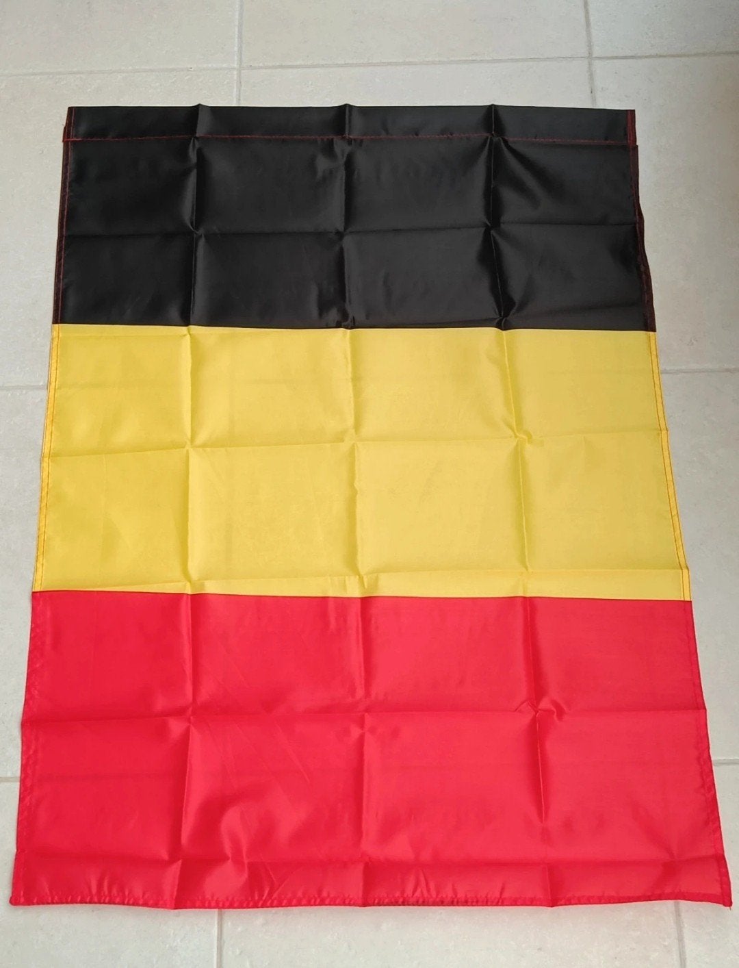 Belgische vlag, Ophalen