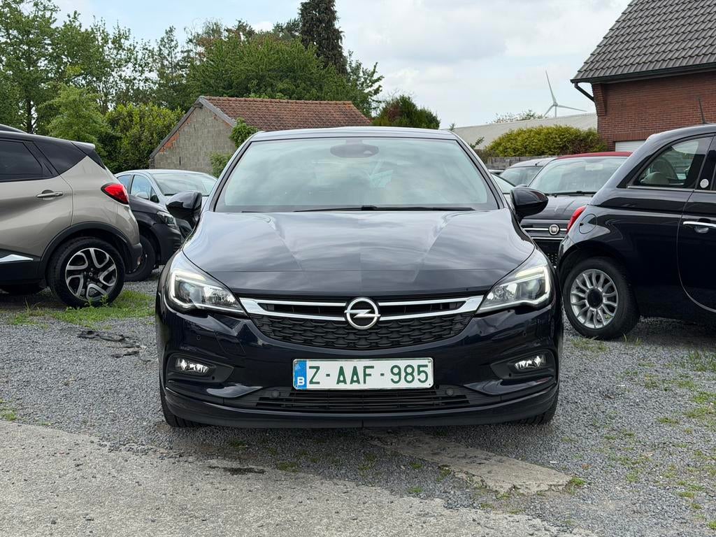 Opel Astra 1.4 Turbo Innovation – Navi – Camera – Cruise, Auto's, Voorwielaandrijving, 4 cilinders, Blauw, Leder en Stof