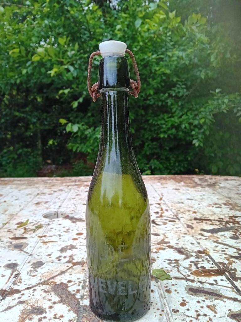 Oude vintage bierfles M Deman Wevelgem, Verzamelen, Biermerken, Ophalen of Verzenden