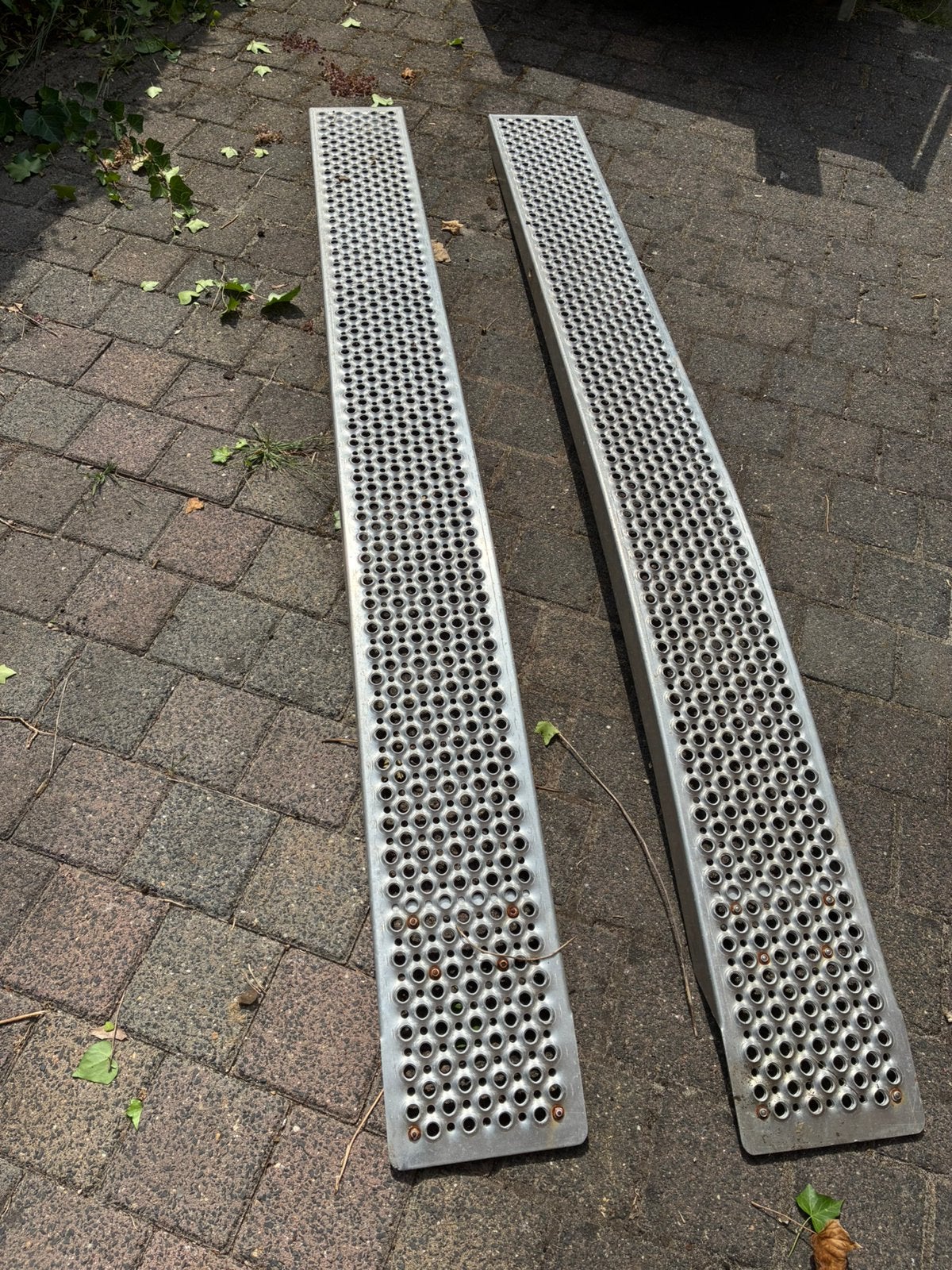 Gebogen rijplaten, Ophalen, Zo goed als nieuw