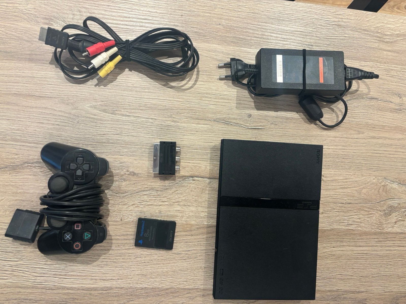 Playstation 2 slim + controller + memory card + 2games, Games en Spelcomputers, Ophalen of Verzenden, Zo goed als nieuw, Slim