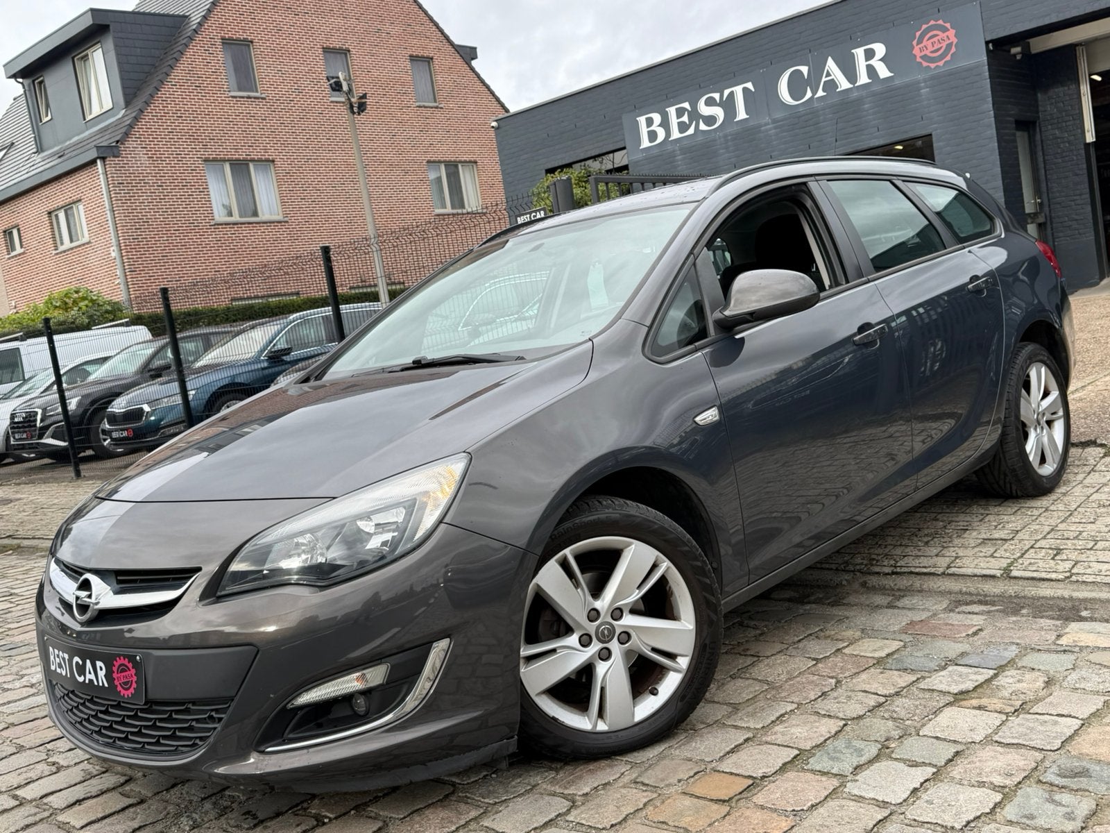 Opel Astra Sports Tourer 1.4Turbo * Garantie, Auto's, 144 g/km, Euro 5, Stof, 4 cilinders
