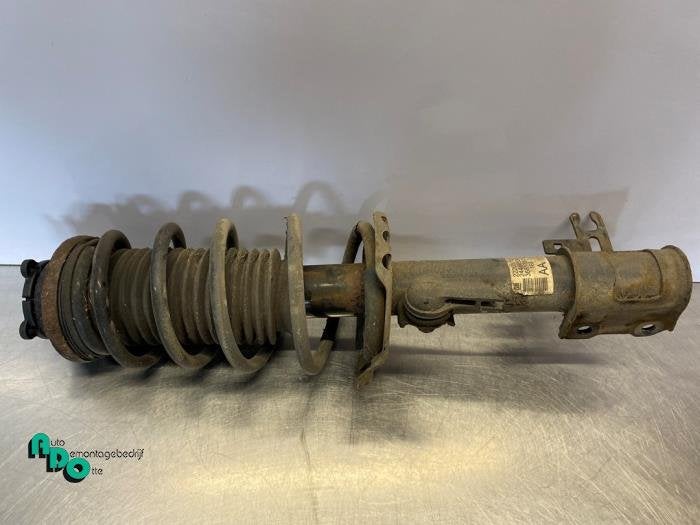 Schokdemperpoot links-voor van een Opel Astra (Astra H 04-), Gebruikt, -, -, Opel