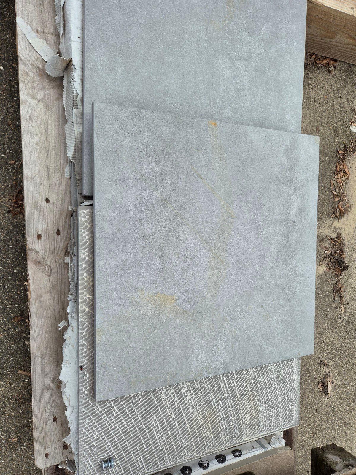 Keramische tegels betonlook, Ophalen