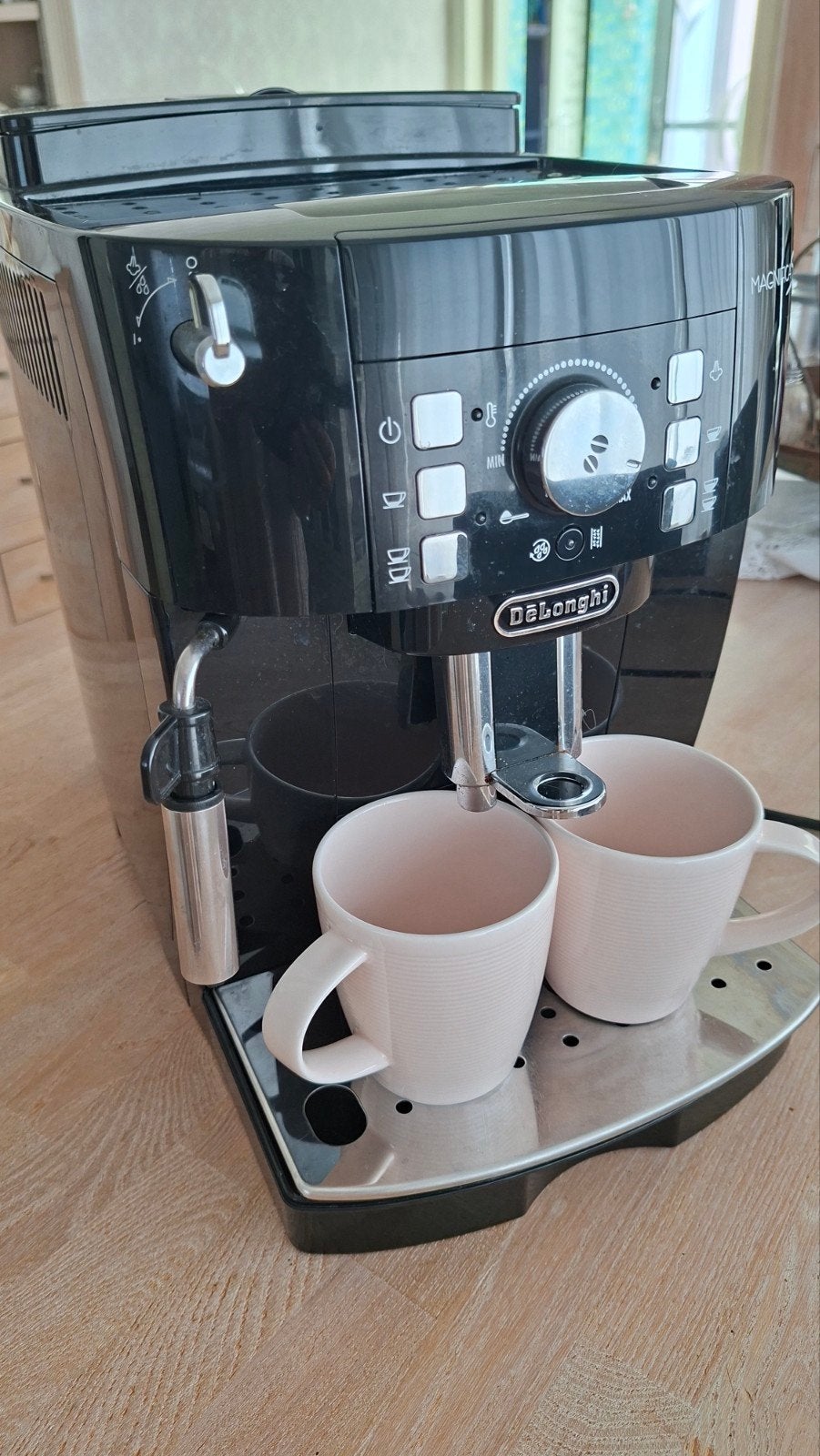 De Longhi espressomachine, Ophalen