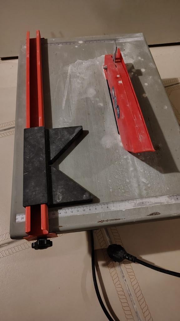 Elektrische tegelzaagmachine, Ophalen