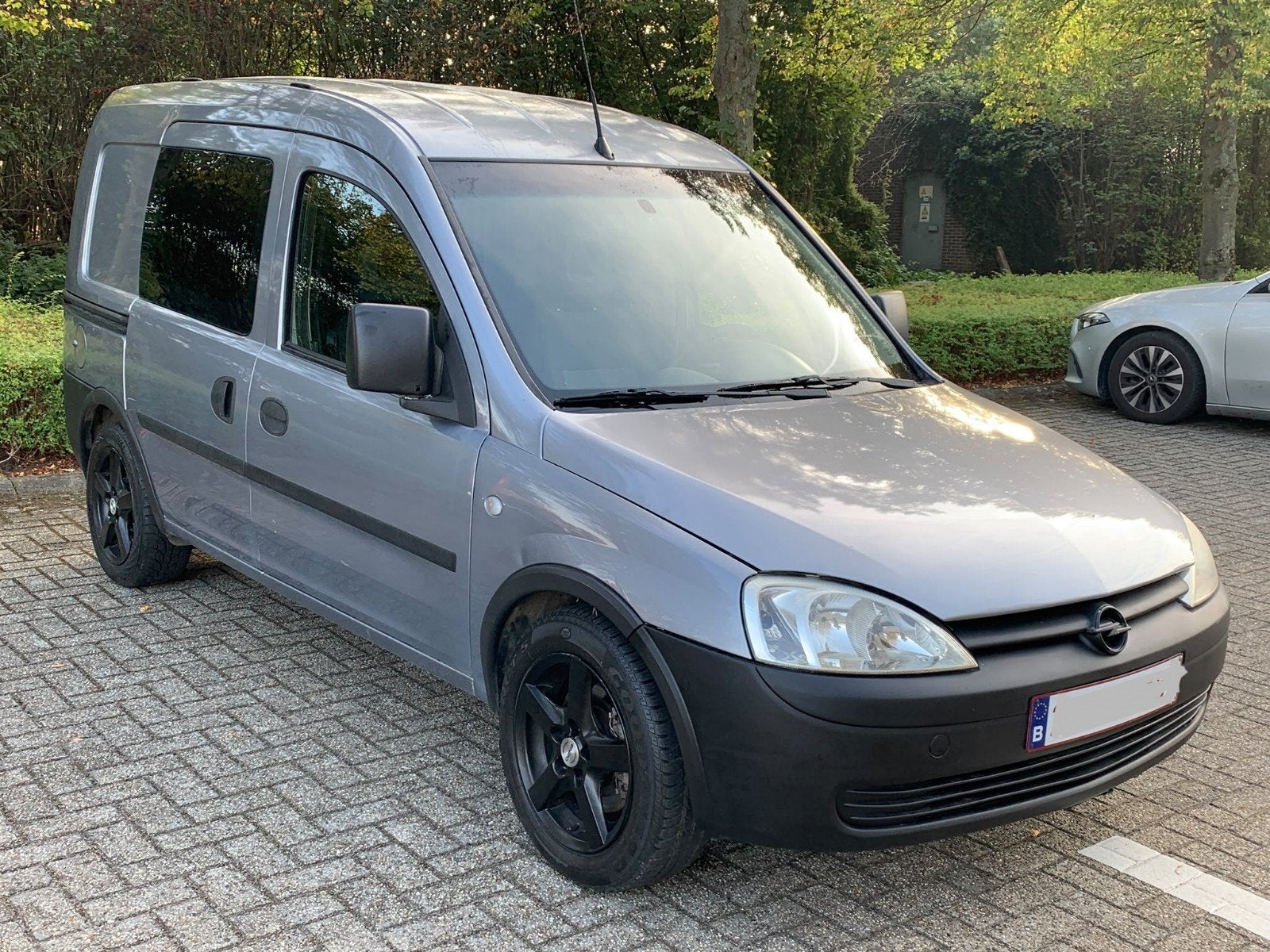 Opel Combo lichte vracht 2009, Auto's, Voorwielaandrijving, 4 deurs, Stof, Zwart
