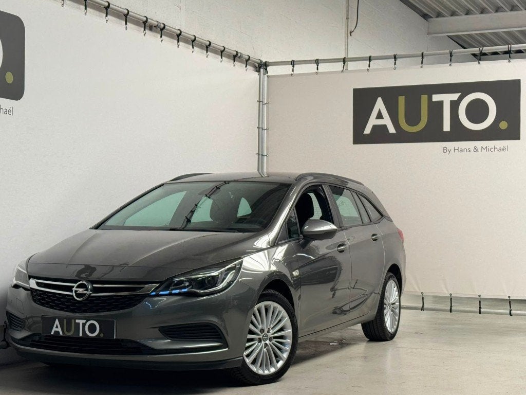 Opel Astra Sports Tourer 1.4 Turbo *NAVI*CARPLAY*TREKHAAK*, Auto's, Voorwielaandrijving, Stof, 4 cilinders, Bedrijf