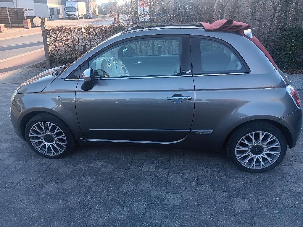 Fiat 500 cabrio 1.2 benzine met airco en garantie, Auto's, Voorwielaandrijving, 4 cilinders, Cabriolet, Leder en Stof