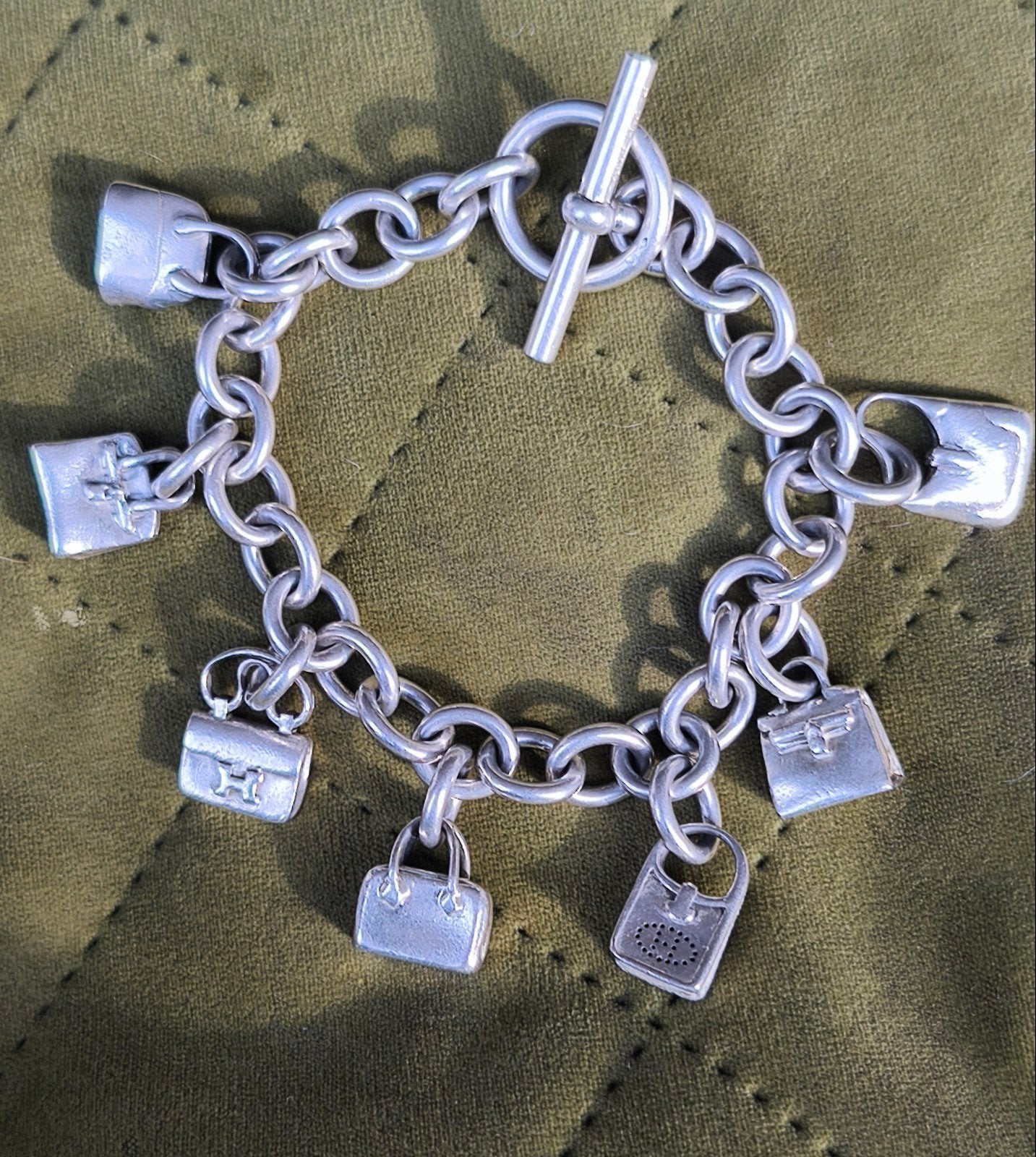 vintage Hermès zilveren armband, 4 bedels of meer, Ophalen of Verzenden, Zo goed als nieuw, Zilver