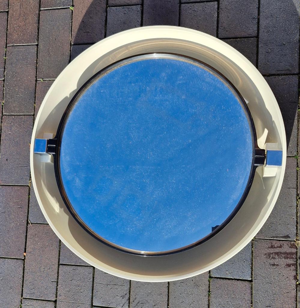 Spiegel space age rond, Enlèvement, Rond