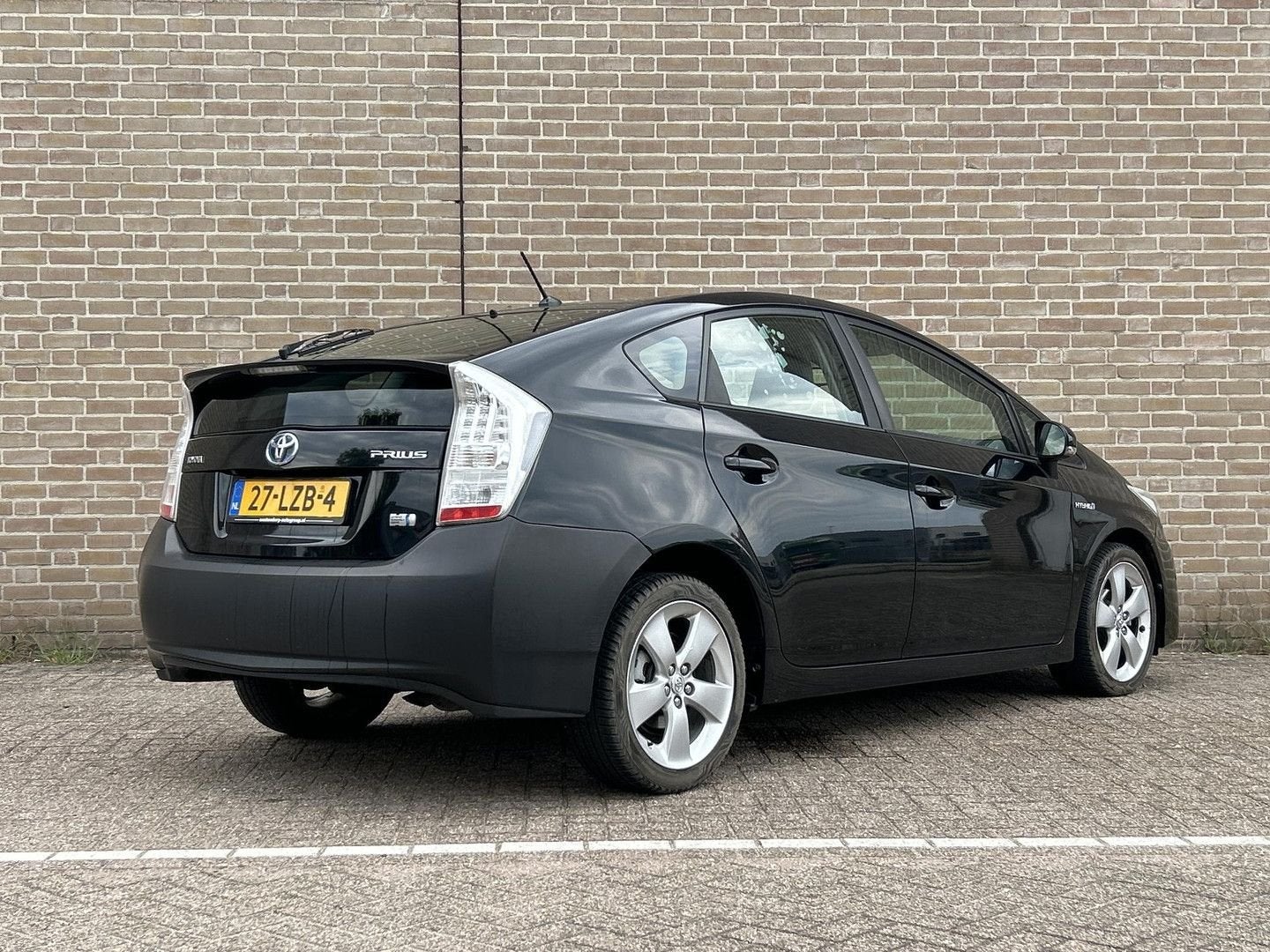 Toyota Prius 1.8 Dynamic | Camera | Cruise | Climate | Navi, Automaat, Zwart, Bedrijf, Berline