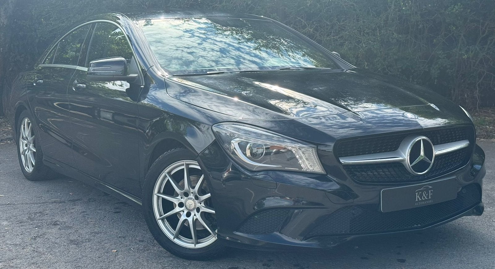 Mercedes-Benz CLA 180 Sportback benzine 113.868 km, Auto's, CLA, Navigatiesysteem, Leder en Stof, Zwart