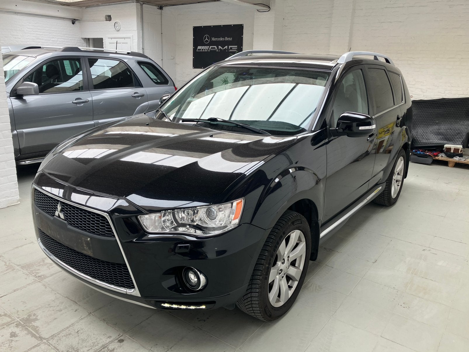 Mitsubishi Outlander 2.2D 4x4 Automaat 7pl..!, Auto's, Automaat, Outlander, Leder, Bedrijf