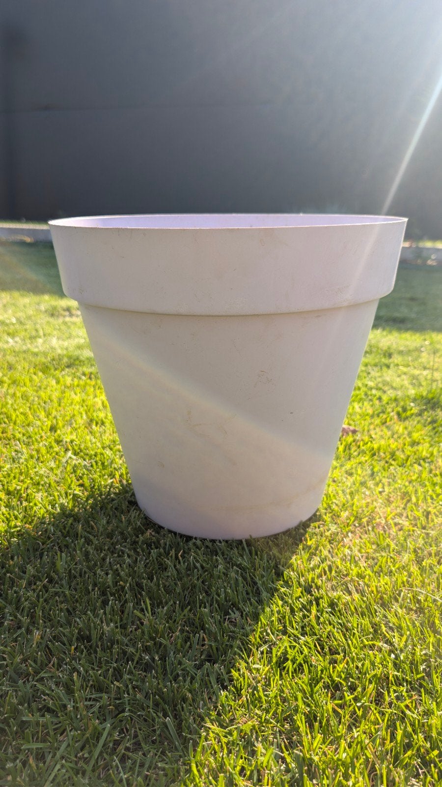 Ronde bloempot plastic, Ophalen