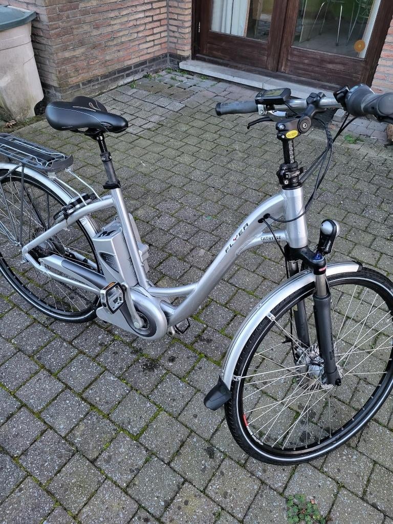 flyer electrische fiets met nieuwe batterij twv 489 euro, Vélos & Vélomoteurs, Vélos électriques, Comme neuf, Autres marques, 50 km par batterie ou plus